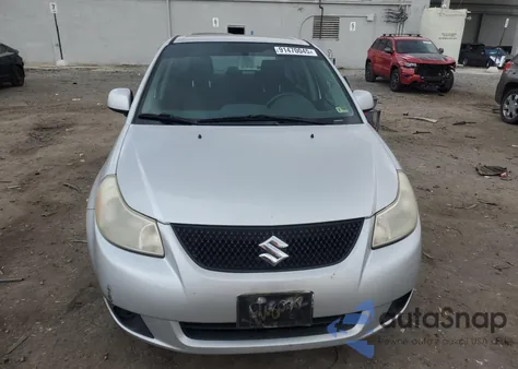 2010 Suzuki Sx4 Le z USA, uszkodzony, nr VIN JS2YC5A28A6302731